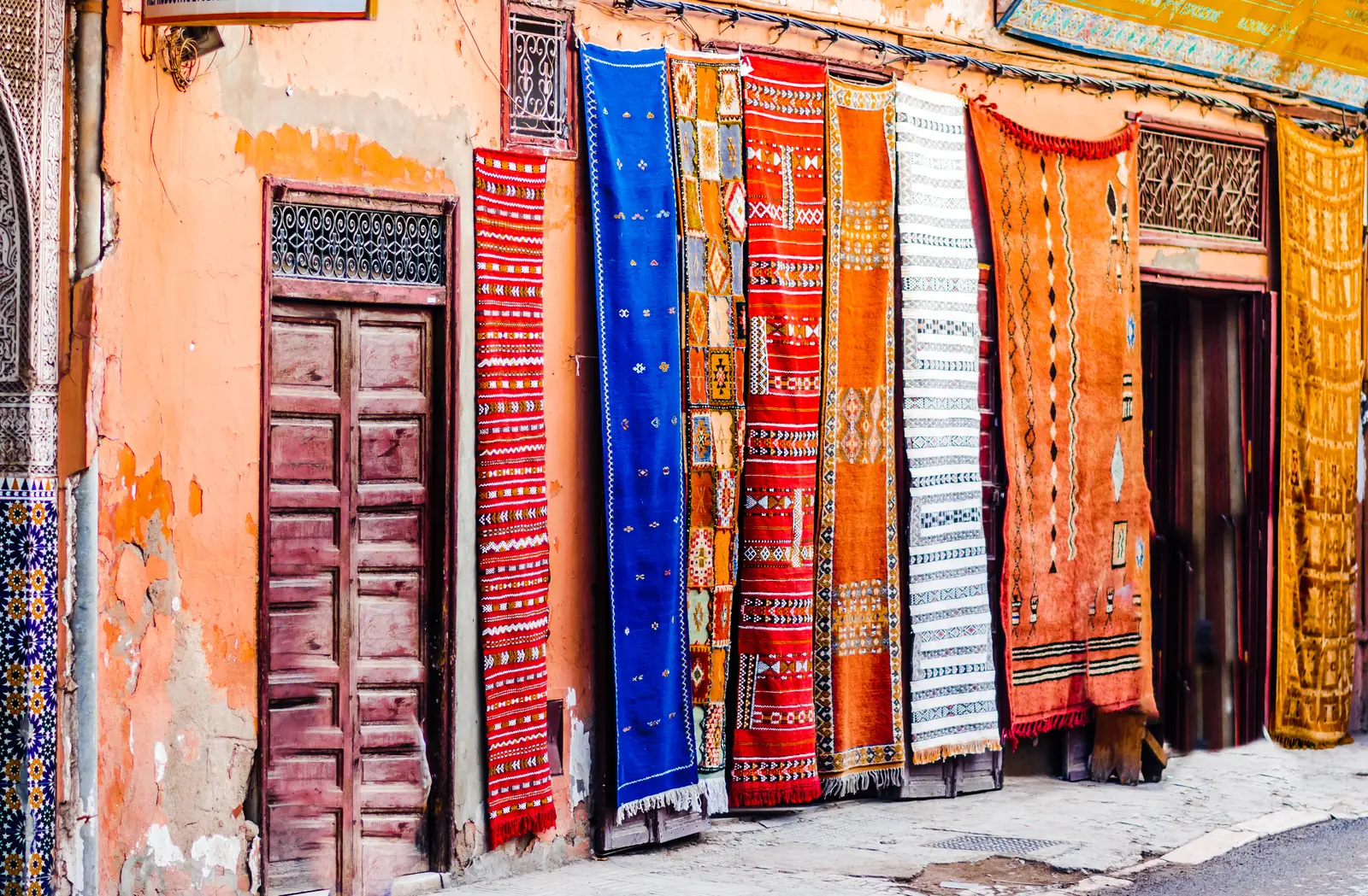 Berber carpets hanging in a Marrakech souk